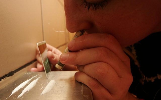 A woman snorts coke in the toilet of a Jerusalem bar. (illustrative photo credit: Michal Fattal/Flash90) A woman snorts coke in the toilet of a Jerusalem bar. (illustrative photo credit: Michal Fattal/Flash90)