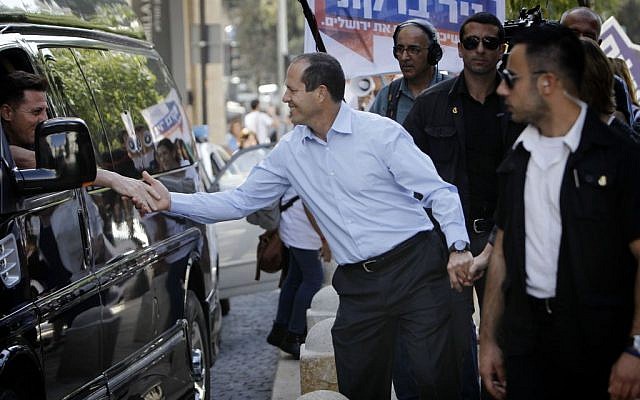 Nir Barkat shaking hands with a driver on Tuesday. (photo credit: Miriam Alster/Flash90)