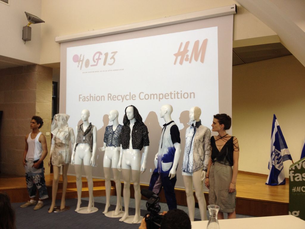 The contestants in H&M's recycling competition, with the winning piece in the middle (fourth from the left) (photo credit: Jessica Steinberg/Times of Israel)