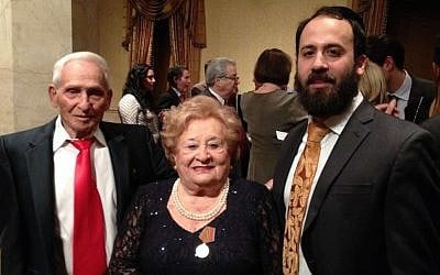 Illustrative: Aron Bell, the last surviving Bielski brother, with fellow partisan Leah Johnson and her grandson Rabbi Zev Johnson at a Jewish Partisan Educational Foundation tribute dinner in New York City. (photo credit: Renee Ghert-Zand)