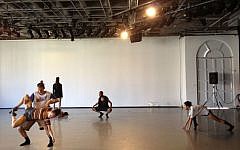 Members of Batsheva Dance Company's senior ensemble performing part of 'Sadeh21' in a preview of the 2014 season. (photo credit: Jessica Steinberg/Times of Israel)