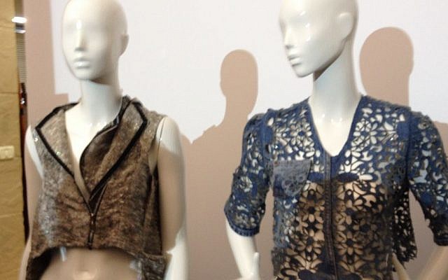 The winner, a laser-cut denim jacket made out of old 501s (right), and the runner-up, cut from a princess-style jacket (photo credit: Jessica Steinberg/Times of Israel) The winner, a laser-cut denim jacket made out of old 501s (right), and the runner-up, cut from a princess-style jacket (photo credit: Jessica Steinberg/Times of Israel)