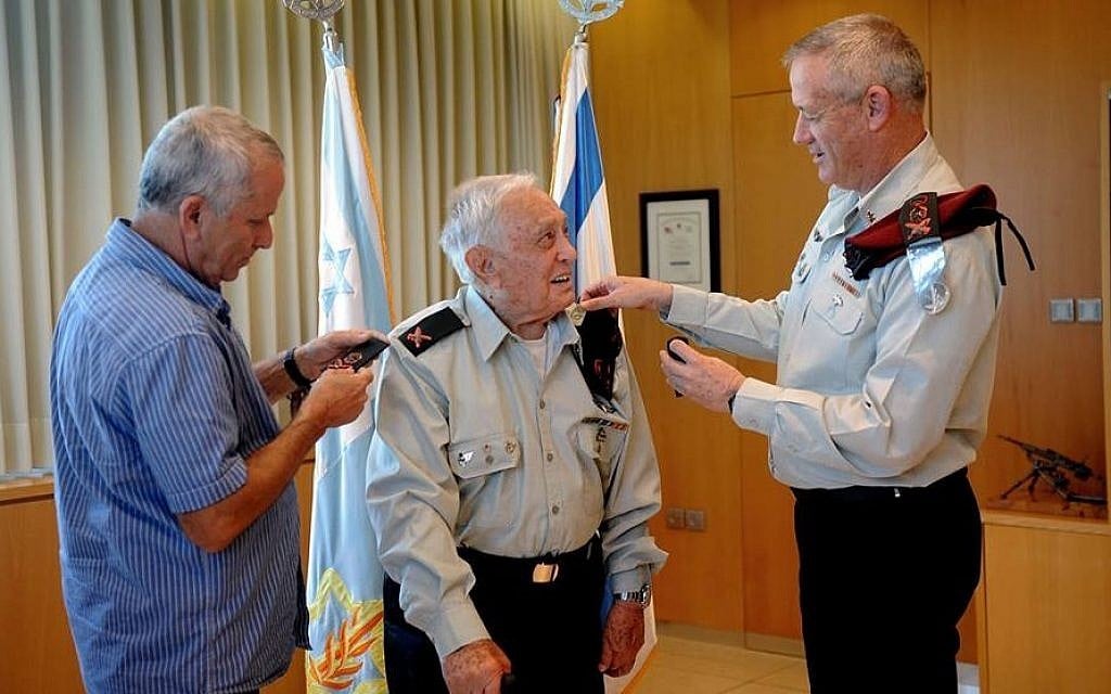 Lt. Gen. Benny Gantz (right), slipping the general's rank on Pundak's left shoulder. (photo credit: IDF Spokesperson's blog) Lt. Gen. Benny Gantz (right), slipping the general's rank on Pundak's left shoulder. (photo credit: IDF Spokesperson's blog)