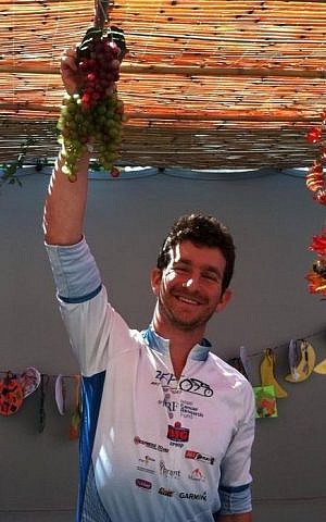 Tom Peled in a sukkah during his just-completed bike tour (photo: courtesy)