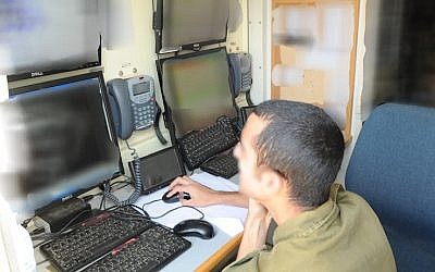 A member of the Lotem unit monitors field activity at Lotem headquarters. (photo: IDF Spokesperson)