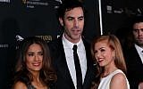 Salma Hayek, left, Sacha Baron Cohen, center, and Isla Fisher pose together at the 2013 BAFTA Los Angeles Britannia Awards at the Beverly Hilton Hotel on Saturday, Nov. 9, 2013 in Beverly Hills, Calif. (photo credit: Matt Sayles/Invision/AP)