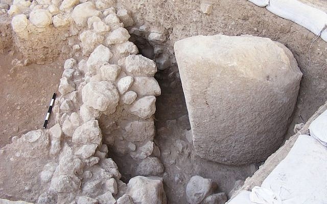 The standing stone (mazzevā) which is worked on all of its sides, serving as evidence of cultic activity in the Chalcolithic period. (photo credit: Zinobi Moskowitz, courtesy of the Israel Antiquities Authority)