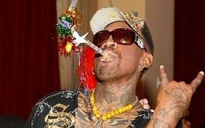 Retired basketball player Dennis Rodman. (photo credit: CC BY-SA OPENsports.com/Flickr)