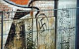 Illustrative photo of graffiti featuring a swastika. (CC BY-HHA124L/Flickr/File)
