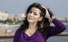 English food writer, journalist and broadcaster, Nigella Lawson poses during the 28th MIPCOM (International Film and Programme Market for Tv, Video,Cable and Satellite) in Cannes, southeastern France, Tuesday, Oct. 9, 2012. (photo credit: AP Photo/Lionel Cironneau )