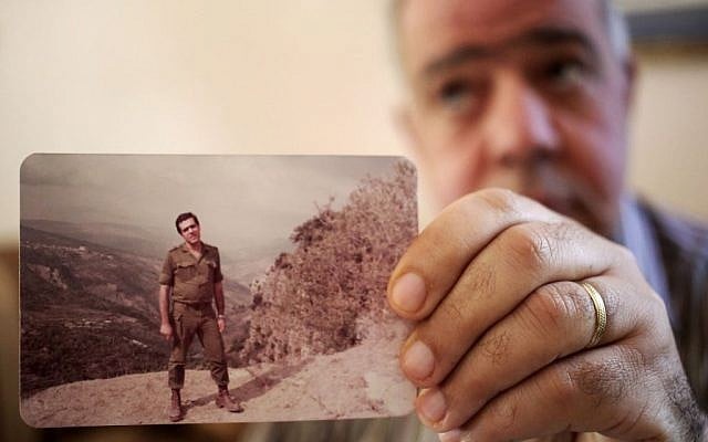 Assaad Chaftari, once deputy chief in the intelligence service of the Lebanon’s feared Lebanese Forces militia, shows his picture with the military form of the Christians’ Lebanese Forces militia, during an interview on Sept. 22, 2013. (photo credit: AP/Hussein Malla) Assaad Chaftari, once deputy chief in the intelligence service of the Lebanon’s feared Lebanese Forces militia, shows his picture with the military form of the Christians’ Lebanese Forces militia, during an interview on Sept. 22, 2013. (photo credit: AP/Hussein Malla)