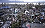 Tacloban Airport is covered by debris after powerful Typhoon Haiyan hit Tacloban city, in Leyte province in central Philippines, Saturday, Nov. 9, 2013 (photo credit: AP/Bullit Marquez)