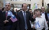 Mayor of Jerusalem Nir Barkat (center), Head of the Jewish Agency, Natan Sharansky (right) and US Jewish Federations' board chairman Michael Siegal (left) march at the Federations' General Assembly (GA) final ceremony, November 12, 2013 (photo credit: Yonatan Sidnel/Flash90)