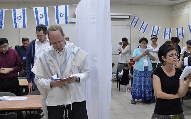 Member of Beersheba's Kehilat Be'erot praying. (photo credit: courtesy)