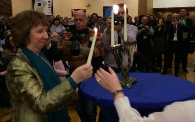 Cathrine Ashton lighting Hanukkah candles at an annual event in Brussels, Belgium, Wednesday, November 27, 2013 (photo credit: official)
