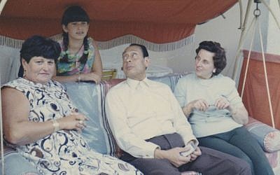 On their 1969 visit to Berlin, a teenage Carla Greenspan is shown with her mother, Anna Gutman, and their hosts, Mohamed and Emmi Helmy (Courtesy Carla Greenspan/JTA)