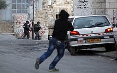 Illustrative photo of a stone throwing attack in East Jerusalem, February 8, 2013 (photo credit: Sliman Khader/Flash90)