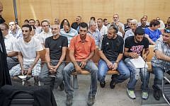 The defendants convicted of of beating AWOL IDF soldier Eden Natan-Zada to death in August 2005 after Zada went on a shooting spree to protest the Gaza disengagement, at the Haifa District Court on July 29, 2013. (photo credit: Moran Mayan/Flash90)