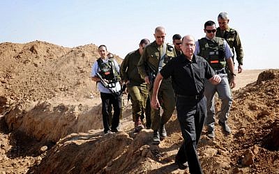 Defense Minister Moshe Ya'alon on a recent tour of the Gaza border (Photo credit: Alon Basson/ Ministry of Defense/ Flash 90)