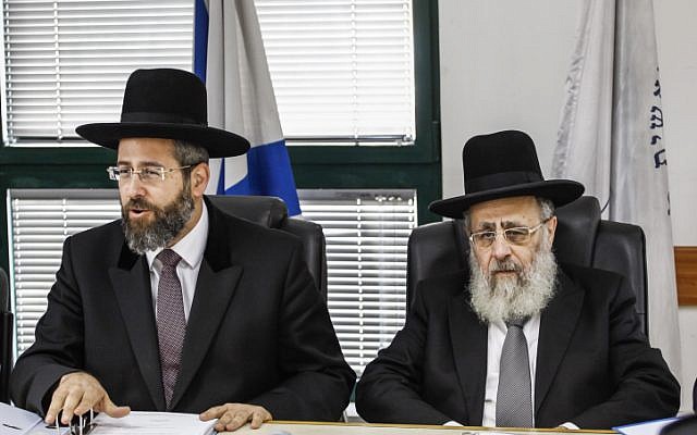 Chief Ashkenazi Rabbi David Lau (L) and Sephardi Chief Rabbi Yitzhak Yosef attend a meeting of the Rabbinate Council in Jerusalem on November 4, 2013. (photo credit: Flash90) Chief Ashkenazi Rabbi David Lau (L) and Sephardi Chief Rabbi Yitzhak Yosef attend a meeting of the Rabbinate Council in Jerusalem on November 4, 2013. (photo credit: Flash90)