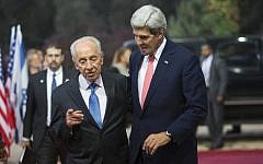 President Shimon Peres meets with US Secretary of State John Kerry at the President's Residence in Jerusalem on November 6, 2013. (Photo credit:  Yonatan Sindel/Flash90)