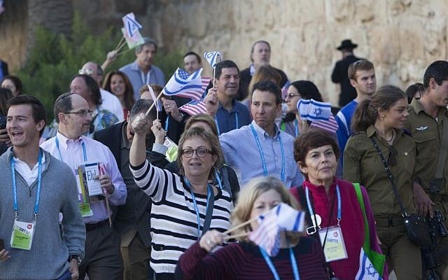 Members of the US Jewish Federations march near the Old City walls during the General Assembly final ceremony, November 12, 2013. (Photo credit: Yonatan Sindel/Flash90) Members of the US Jewish Federations march near the Old City walls during the General Assembly final ceremony, November 12, 2013. (Photo credit: Yonatan Sindel/Flash90)