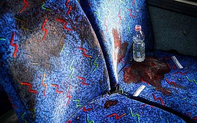 A bloodstained bus seat where soldier Eden Atias, 19, was stabbed to death by a young Palestinian man on a bus at the central bus station in Afula (photo credit: Avishag Shaar Yashuv/Flash90) A bloodstained bus seat where soldier Eden Atias, 19, was stabbed to death by a young Palestinian man on a bus at the central bus station in Afula (photo credit: Avishag Shaar Yashuv/Flash90)