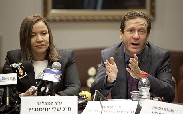 Shelly Yachimovich and Isaac Herzog at a Labor Party Knesset faction meeting in 2013. (Flash90) Shelly Yachimovich and Isaac Herzog at a Labor Party Knesset faction meeting in 2013. (Flash90)