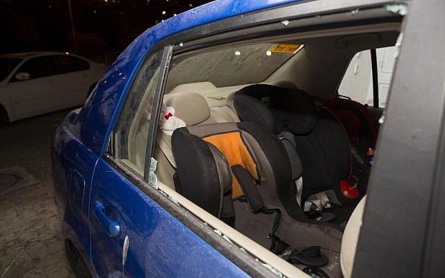 The car in which Avigail Ben Zion, 2, was injured by a stone near her home in Armon Hanatziv, Jerusalem, November 28, 2013. (Photo credit: Yonatan Sindel/Flash90) The car in which Avigail Ben Zion, 2, was injured by a stone near her home in Armon Hanatziv, Jerusalem, November 28, 2013. (Photo credit: Yonatan Sindel/Flash90)