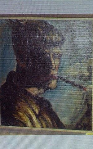 A painting of Otto Dix 'Selbstportrait Rauchend' ('Selfportrait Smoking') is projected on a screen during a news conference in Augsburg, southern Germany, Tuesday, Nov. 5, 2013, on the art found in Munich. (photo credit: AP/Kerstin Joensson)