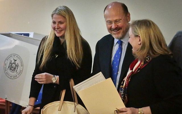 Republican mayoral candidate Joe Lhota, center, his wife Tamra, right, and daughter Kathryn, share a moment of laughter after voting in the general election on Tuesday, Nov. 5, 2013, in the Brooklyn borough of New York. (photo credit: AP Photo/Bebeto Matthews) Republican mayoral candidate Joe Lhota, center, his wife Tamra, right, and daughter Kathryn, share a moment of laughter after voting in the general election on Tuesday, Nov. 5, 2013, in the Brooklyn borough of New York. (photo credit: AP Photo/Bebeto Matthews)