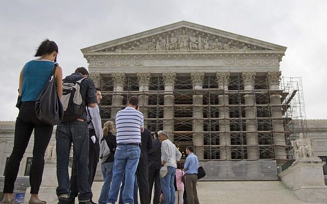 People wait in line to enter the US Supreme Court in Washington, DC (photo credit: AP/Evan Vucci/File) People wait in line to enter the US Supreme Court in Washington, DC (photo credit: AP/Evan Vucci/File)