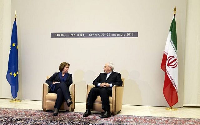 EU High Representative for Foreign Affairs Catherine Ashton, left, sits next to Iranian Foreign Minister Mohammad Javad Zarif, right, in Geneva, Switzerland, on Wednesday, November 20, 2013. (photo credit: AP Photo/Keystone,Salvatore Di Nolfi) EU High Representative for Foreign Affairs Catherine Ashton, left, sits next to Iranian Foreign Minister Mohammad Javad Zarif, right, in Geneva, Switzerland, on Wednesday, November 20, 2013. (photo credit: AP Photo/Keystone,Salvatore Di Nolfi)