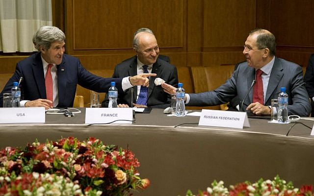 From left, US Secretary of State John Kerry, French Foreign Minister Laurent Fabius, and Russia's Foreign Minister Sergei Lavrov gather at the United Nations Palais, Sunday, November 24, 2013, in Geneva, Switzerland, during the Iran nuclear talks. (photo credit: AP/Carolyn Kaster, Pool)