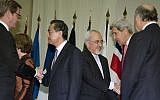 Germany's Foreign Minister Guido Westerwelle, Chinese Foreign Minister Wang Yi, Iranian Foreign Minister Mohammad Javad Zarif, US Secretary of State John Kerry, and French Foreign Minister Laurent Fabius at the UN Palais on November 24, 2013, in Geneva, after announcing an interim deal at the Iran nuclear talks. (photo credit: AP/Carolyn Kaster, Pool)
