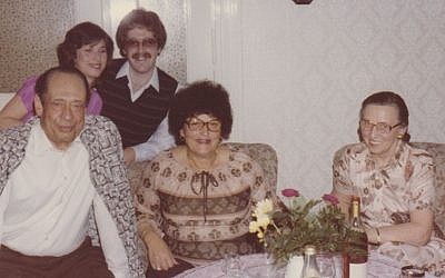 At their Berlin home in 1980, Mohamad and Emmi Helmy flank Anna Gutman; Carla Greenspan and her husband, Barry, appear behind them. (photo credit: Courtesy Carla Greenspan/JTA)