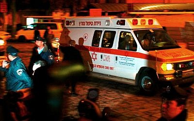 An ambulance bearing former Prime Minister Ariel Sharon enters Hadassah Ein Kerem Hospital outside Jerusalem late on Wednesday,January 4, 2006, after Sharon complained of "not feeling well." A short while after arriving a hospital spokesman announced that Sharon had suffered a "significant stroke." Sharon fell into a coma, from which he has still not awoken. (Photo credit: Nati Shohat/Flash90)