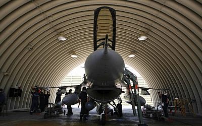 IAF soldiers prepare an F-16 for a combat sortie (photo credit: Nati Shocat/ Flash 90)