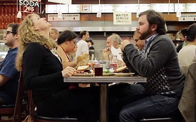 'When Harry Met Sally' gets a real-life take with a comedy improv group at Katz's Deli. (screenshot: YouTube)