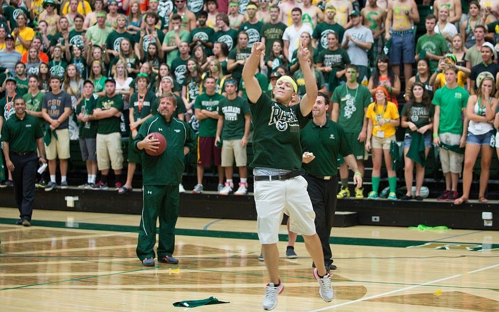 Colorado State University freshman Andrew Schneeweis sinks a half-court shot at a pep rally to win a year’s free tuition. (photo credit:John Eisele/CSU Photography/JTA) Colorado State University freshman Andrew Schneeweis sinks a half-court shot at a pep rally to win a year’s free tuition. (photo credit:John Eisele/CSU Photography/JTA)