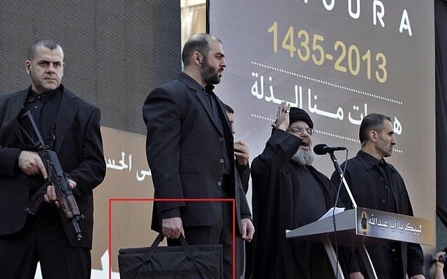 Hassan Nasrallah and his security detail at a recent appearance in Beirut (Photo credit: AP/Bilal Hussein) Hassan Nasrallah and his security detail at a recent appearance in Beirut (Photo credit: AP/Bilal Hussein)