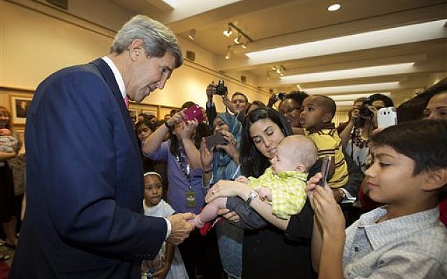 US Secretary of State John Kerry greets the children of US Embassy employees during a visit to the facility in Riyadh November 4, 2013. (photo credit: AP Photo/Jason Reed, Pool) US Secretary of State John Kerry greets the children of US Embassy employees during a visit to the facility in Riyadh November 4, 2013. (photo credit: AP Photo/Jason Reed, Pool)