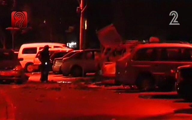 Screen capture from Channel 2 showing the aftermath of a car explosion in Tel Aviv on November 7, 2013. Screen capture from Channel 2 showing the aftermath of a car explosion in Tel Aviv on November 7, 2013.