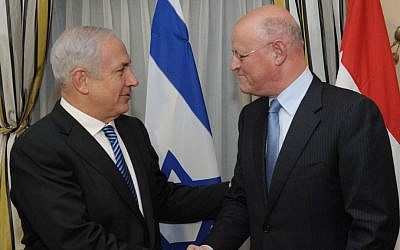 Then-foreign minister of the Netherlands Uri Rosenthal (R) welcomes Prime Minister Benjamin Netanyahu prior to their meeting in The Hague, January 18, 2012. (Amos Ben Gershom/GPO/Flash90)
