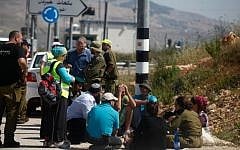 Illustrative photo of Israeli security forces at the site of a terror attack at the Tapuah Junction in the northern West Bank. April 30, 2013. (Photo credit: Flash90.)