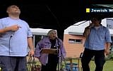 Esther Bejarano, an 86-year-old Holocaust survivor, with hip hop band Microphone Mafia in Germany. (Screen capture)