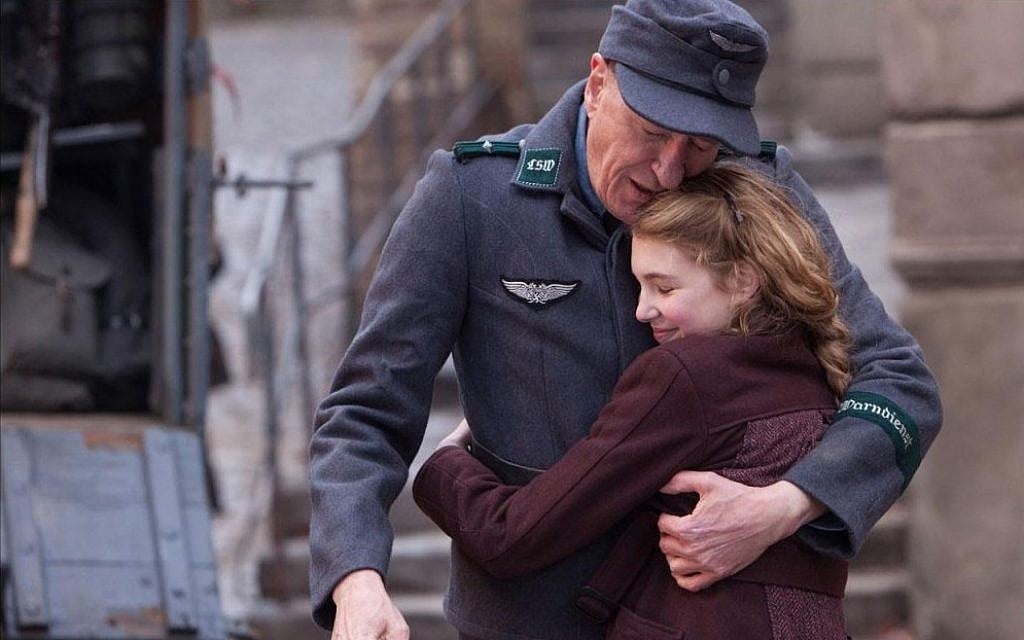'The Book Thief' stars Geoffrey Rush as the proverbial 'Good German' and newcomer Sophie Nelisse as the young girl clinging to her innocence. (photo credit: 20th Century Fox) 'The Book Thief' stars Geoffrey Rush as the proverbial 'Good German' and newcomer Sophie Nelisse as the young girl clinging to her innocence. (photo credit: 20th Century Fox)
