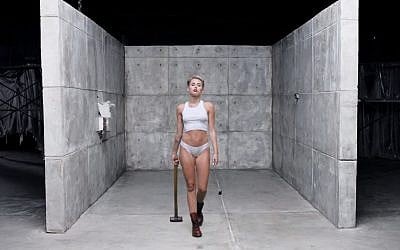 Miley Cyrus in a scene from the clip to her song 'Wrecking Ball' (screen capture: YouTube)