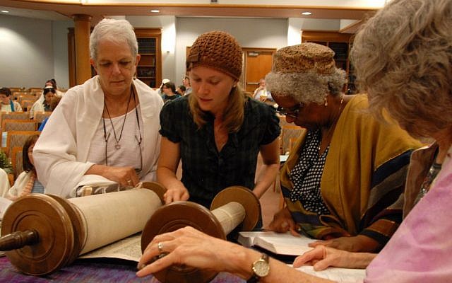 A non-Jewish woman is among those at a Torah reading at Adas Israel Congregation in Washington. Many Conservative synagogues are finding new ways for non-Jews to participate in synagogue life. (photo credit: Adas Israel/JTA)