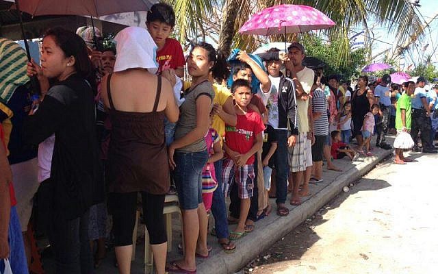 A crowd outside the newly established IDF field hospital in Bogo City, Philippines (Photo credit: IDF Spokesperson's Unit) A crowd outside the newly established IDF field hospital in Bogo City, Philippines (Photo credit: IDF Spokesperson's Unit)